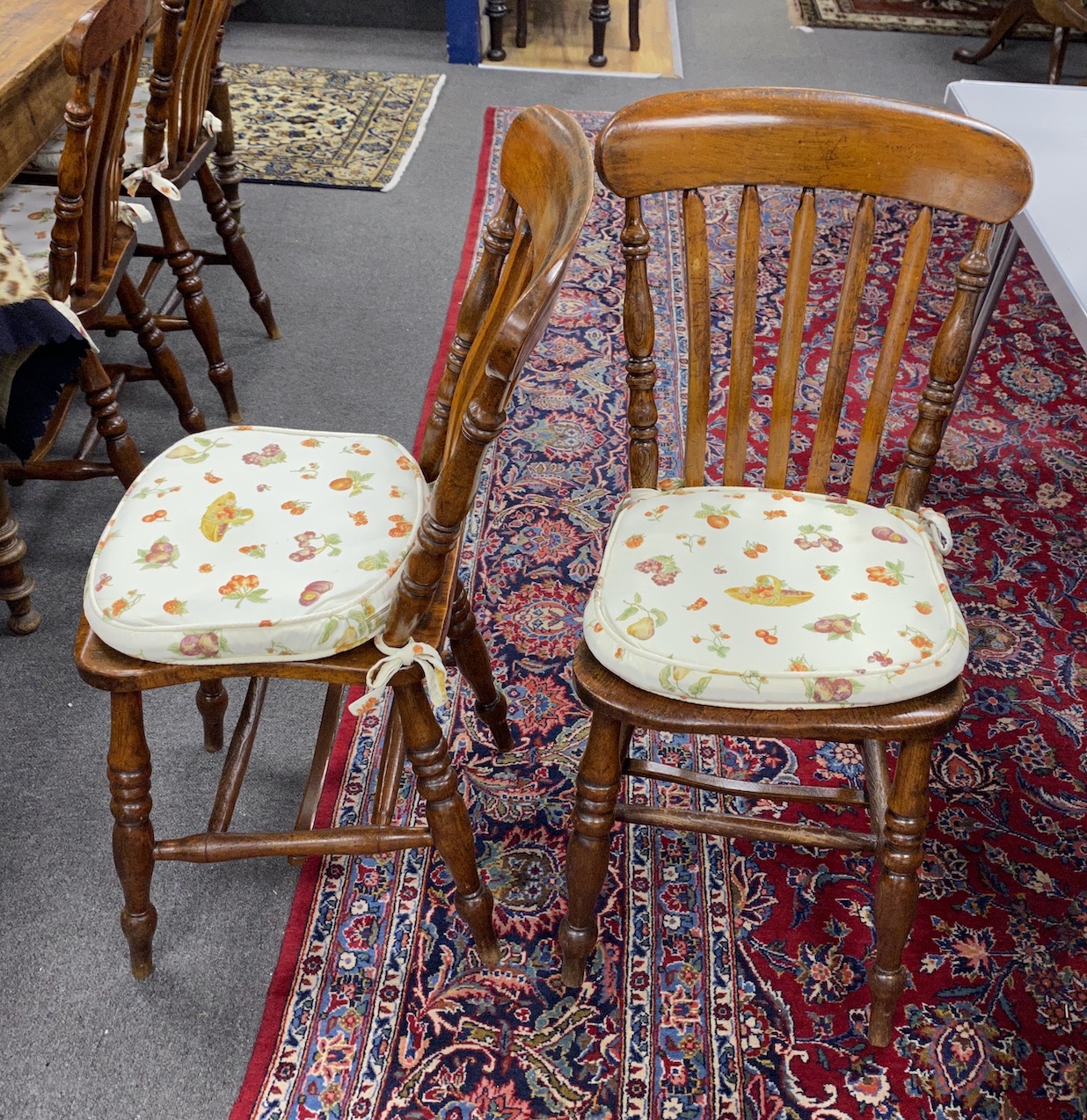 A set of eight Victorian elm and beech Windsor lathe back kitchen chairs, width 37cm, depth 38cm, height 90cm